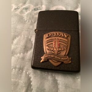 Zippo D-Day 1944-1994 crackle finished lighter.